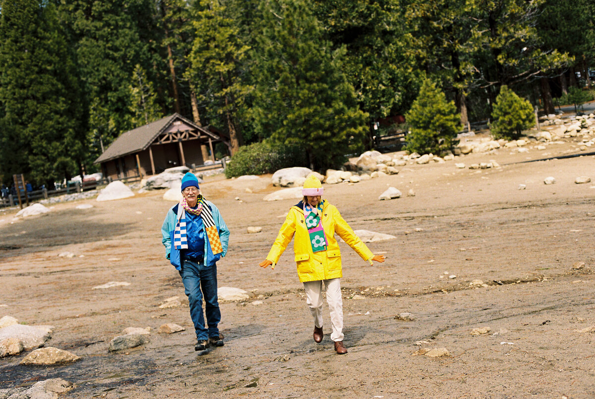 Funny and goofy older couple captured on film by Kate Winters Photography, showcasing a candid and joyful moment in an authentic, documentary style.