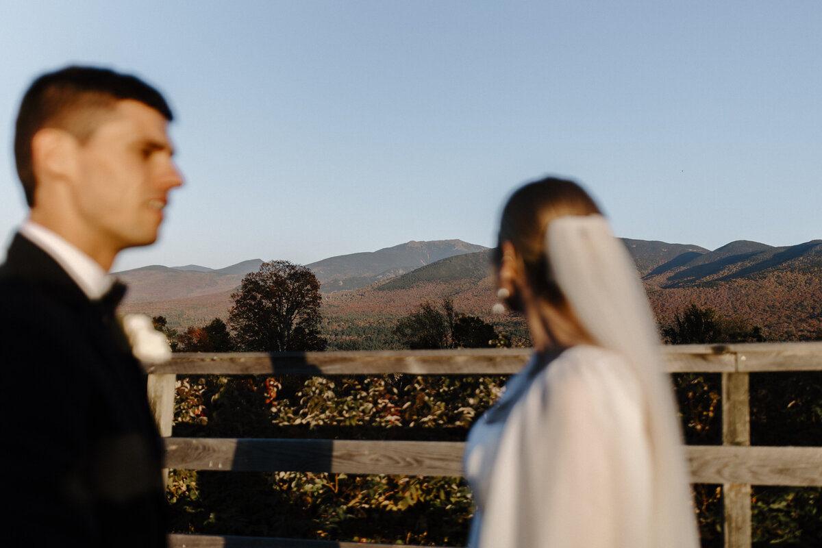 bride and groom laughing at each other