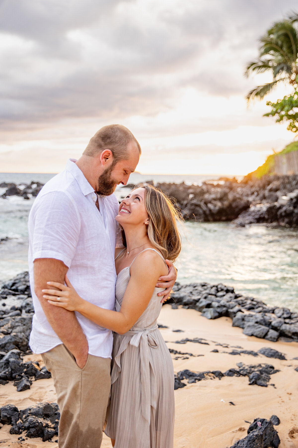 Hawaii Engagement Photographer captures man and woman laughing during photos