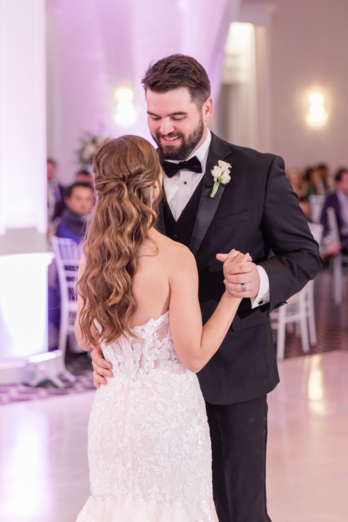 A newly wed couple shares their first dance
