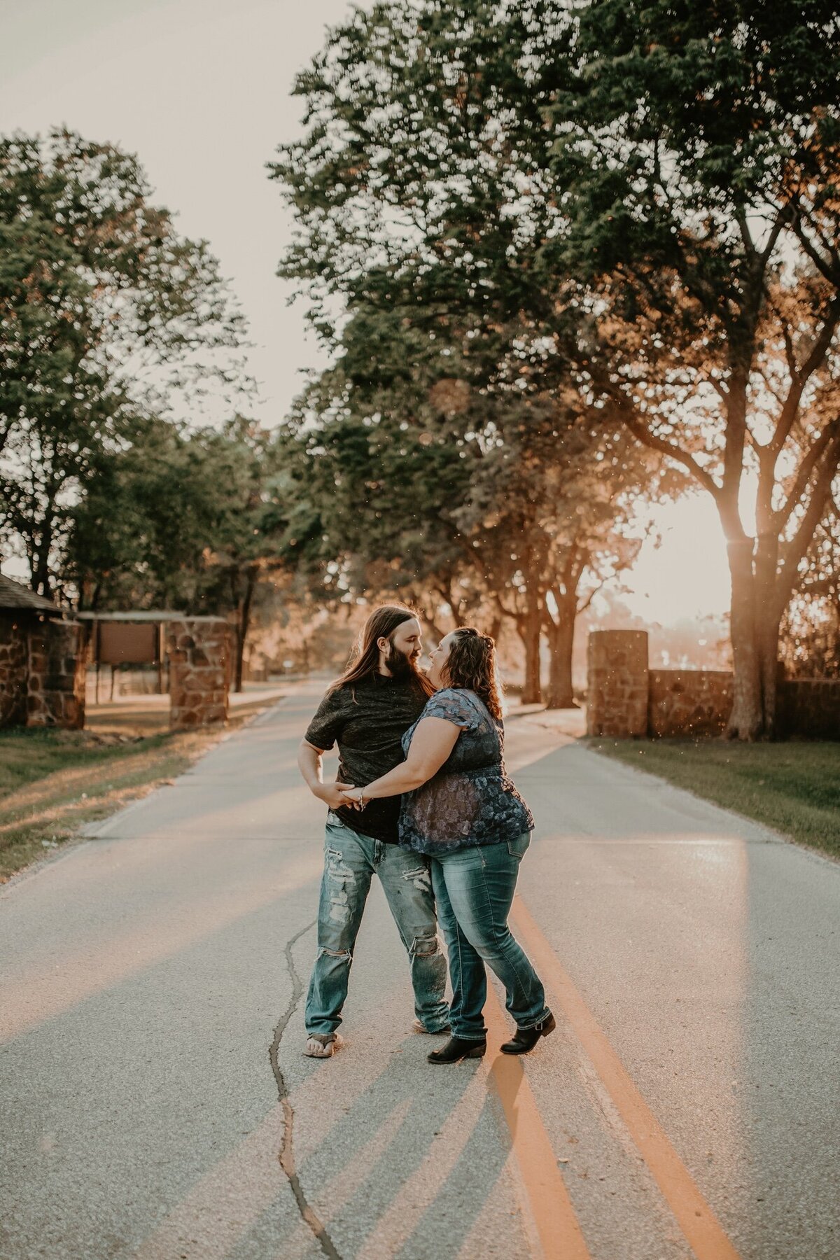 romantic-couple-sunset-road-session-dolliver-state-park-otho-iowa-Storyteller-Collective-Photo-Co