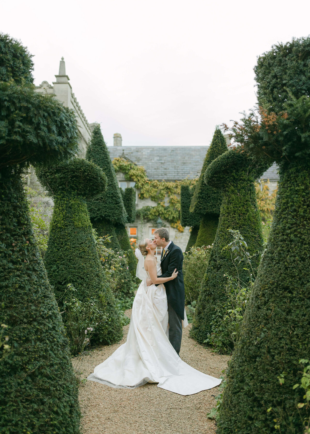 chloe-lowe-wedding-euridge-manor-vivienne-westwood-kiss