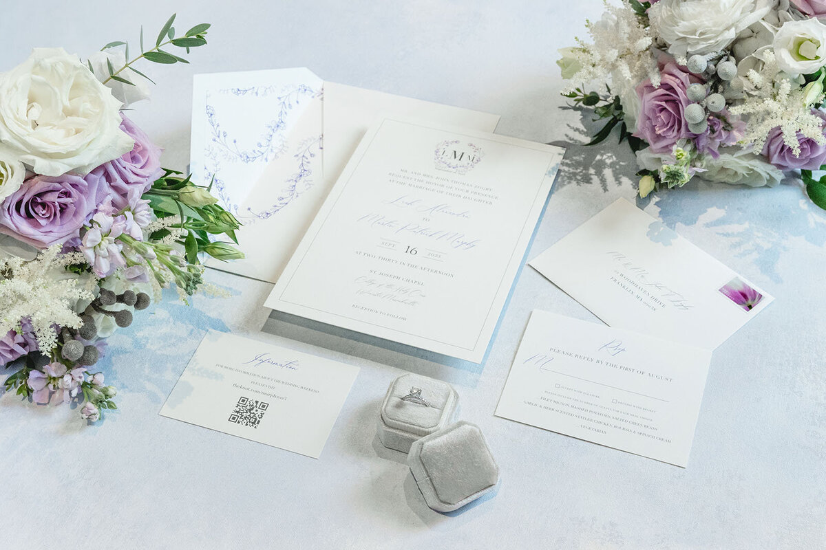 Silver and white wedding invitations