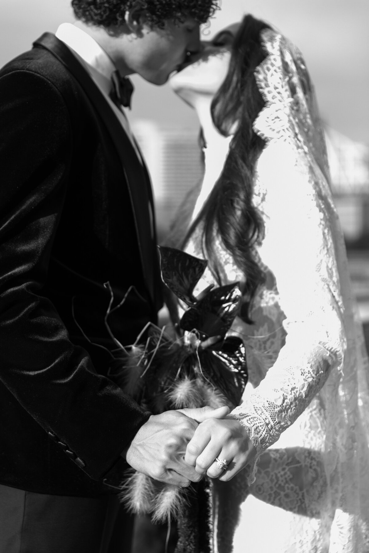 meredith-michel-editorial-wedding-bw-hands-intertwined