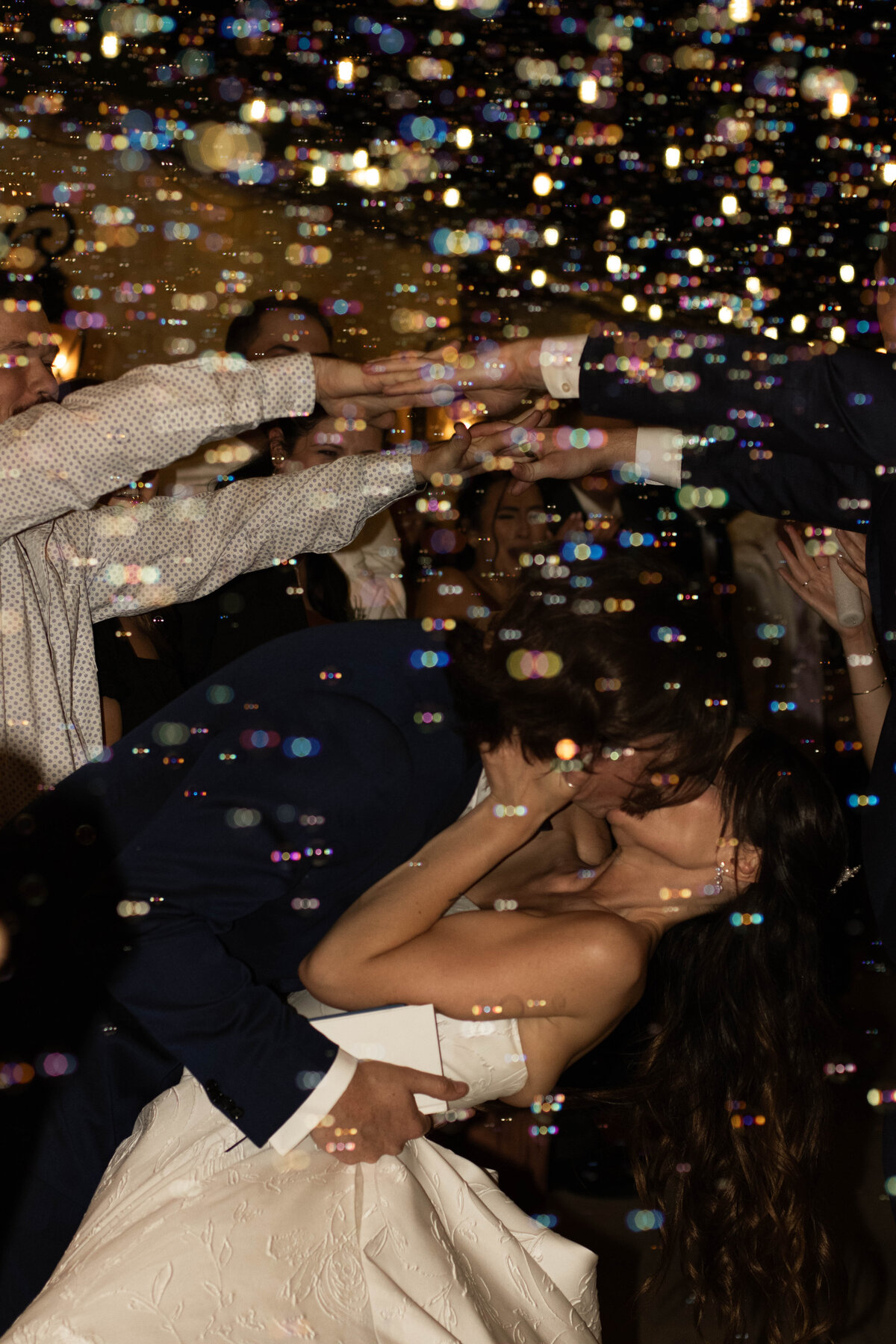 bride and groom wedding exit kiss photo