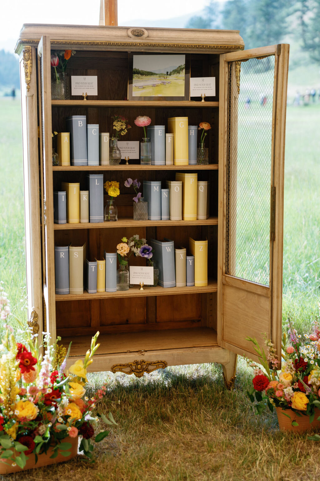 Colorado-wedding-planner-custom-escort-card-book-shelf