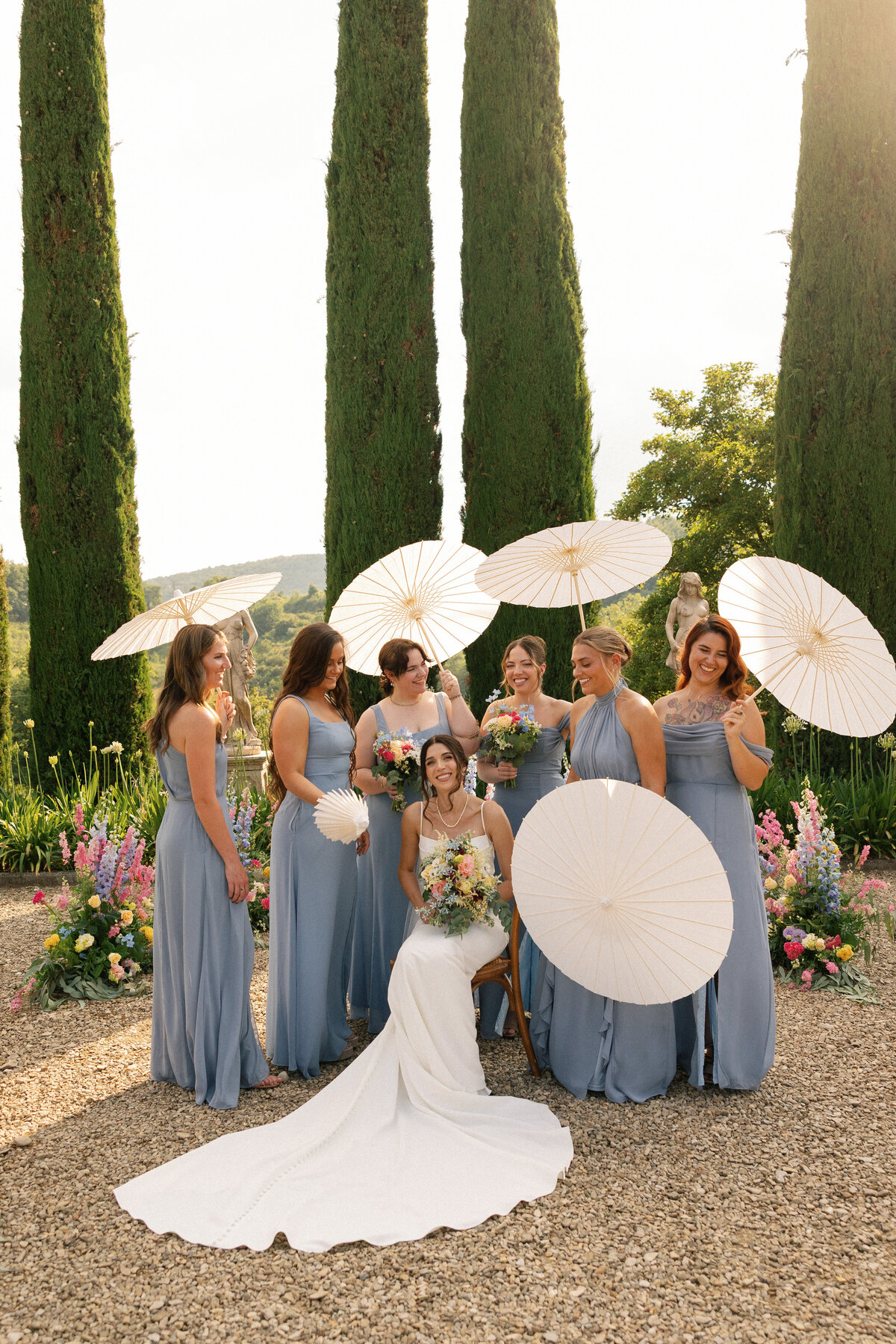 Bridesmaids portraits in elegant gowns at the Tuscany estate