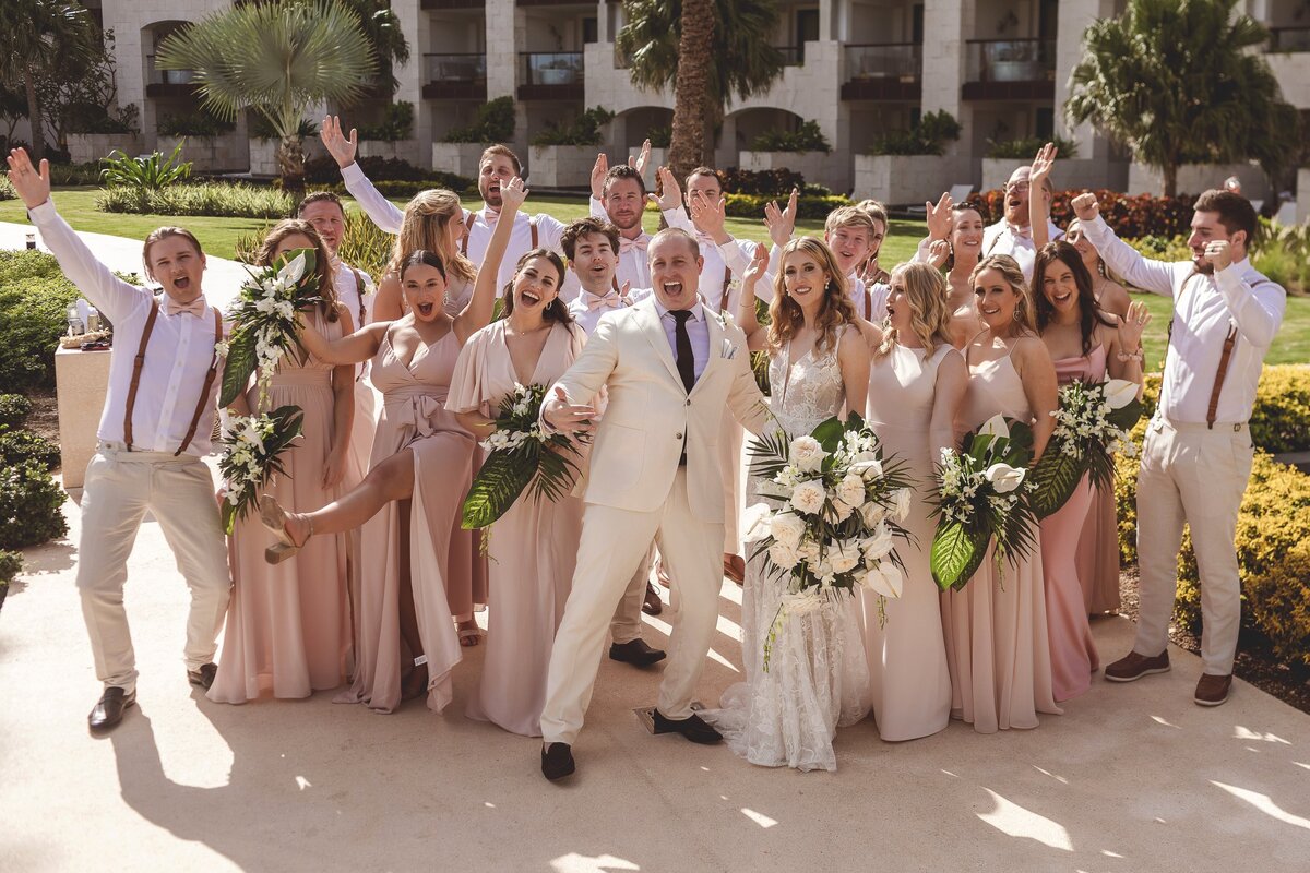 Bridal party having fun at wedding in Riviera Maya