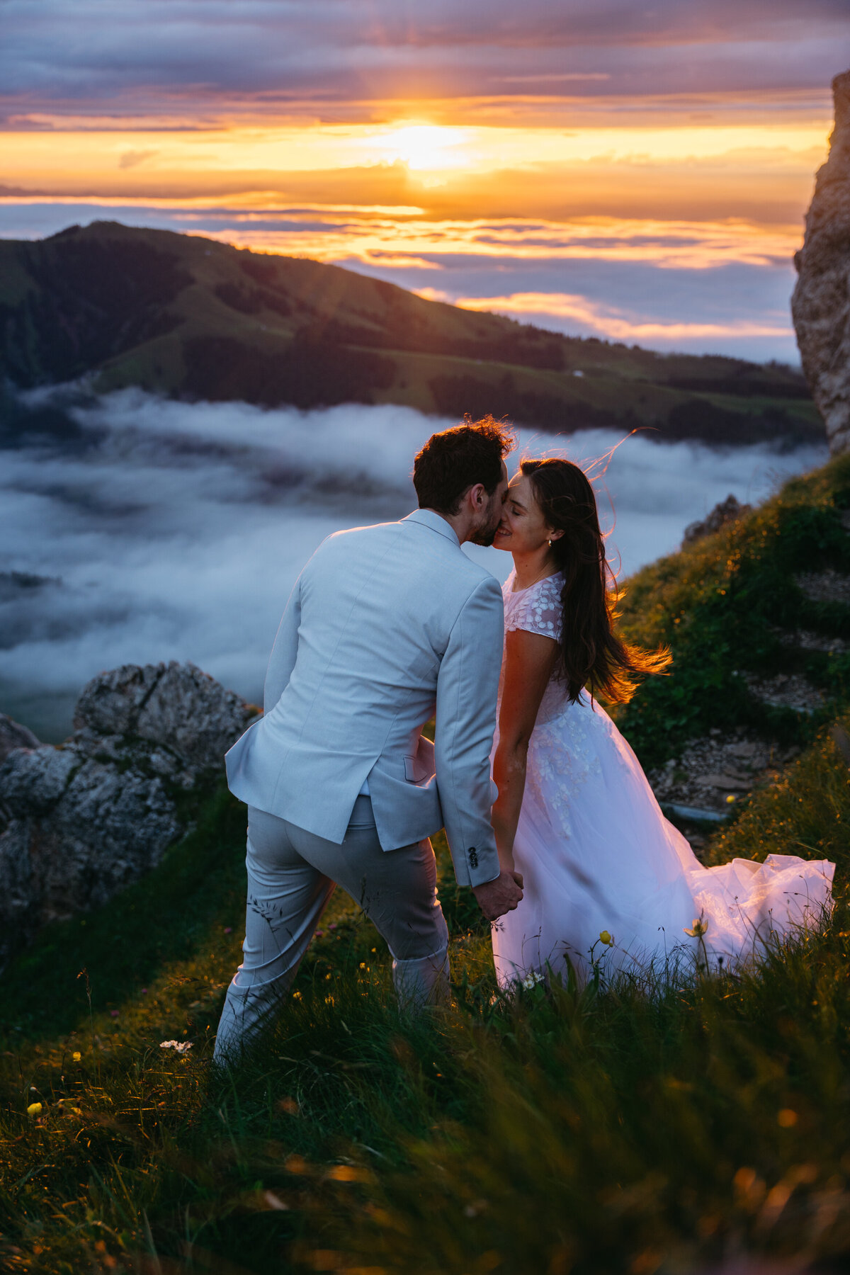 Sunset portrait of bride and groom in Switzerland