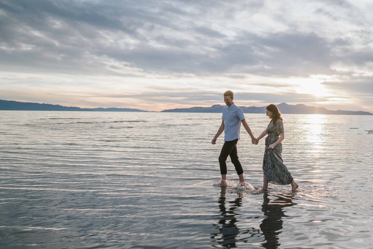 Sacramento Wedding Photographers capture man and woman walking through water