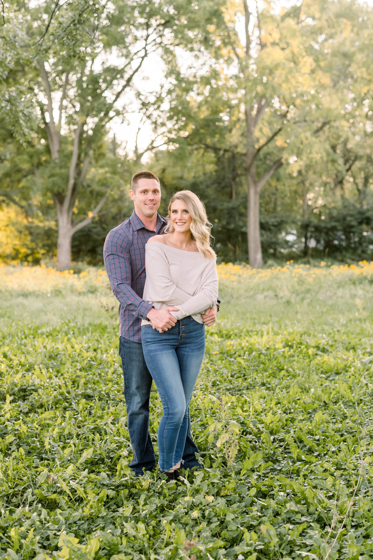 Engaged couple for engagement pictures in Bettendorf, Iowa