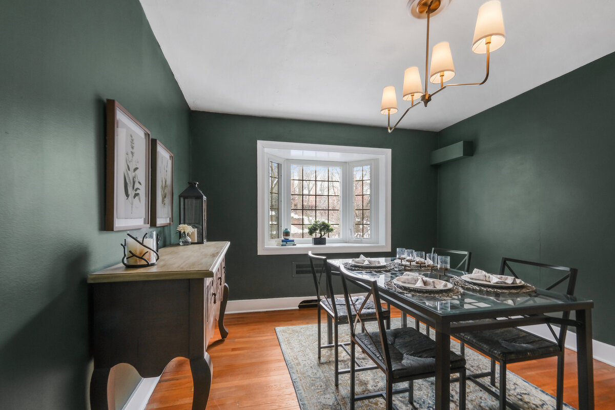 Modern dining room staging highlighting open-concept living and buyer-focused design