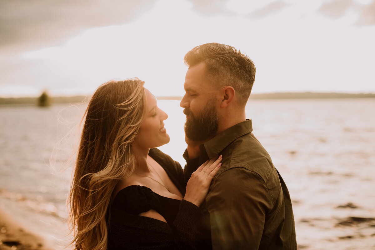 alana-andrew-engagement-cottage-beach-lake-sunset-dock-algonquin-10