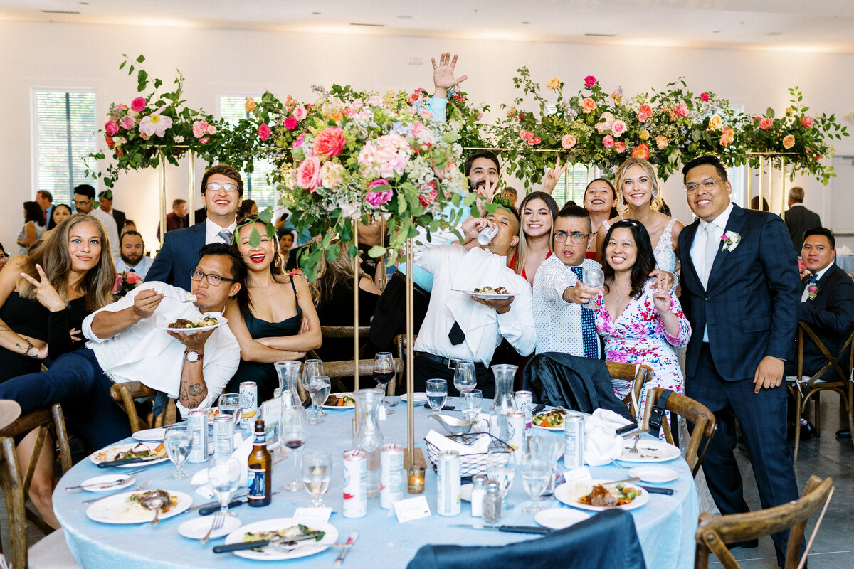 group photo, newlyweds with guests