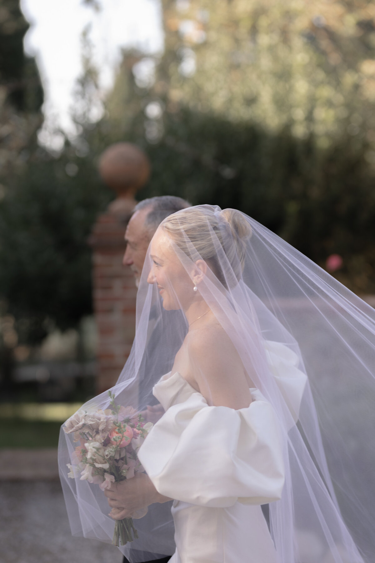 The bride makes her entrance at her Italian wedding ceremony