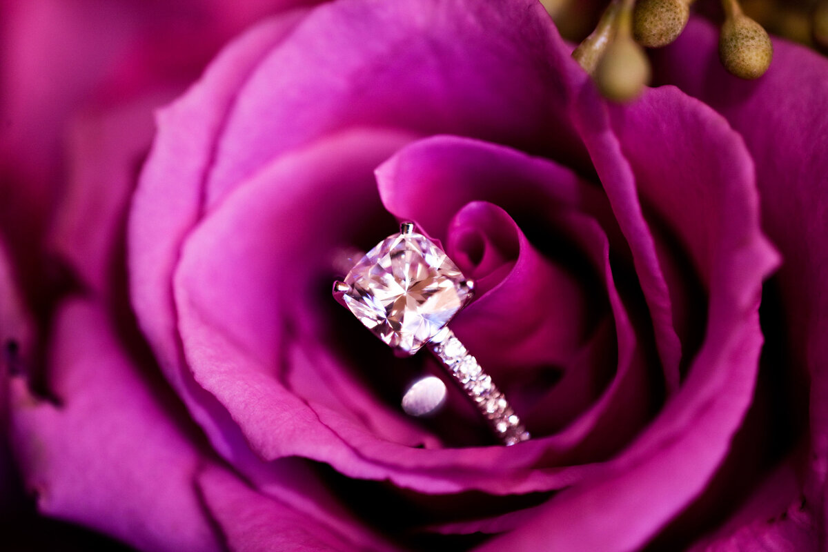 Background image of wedding ring in purple flower