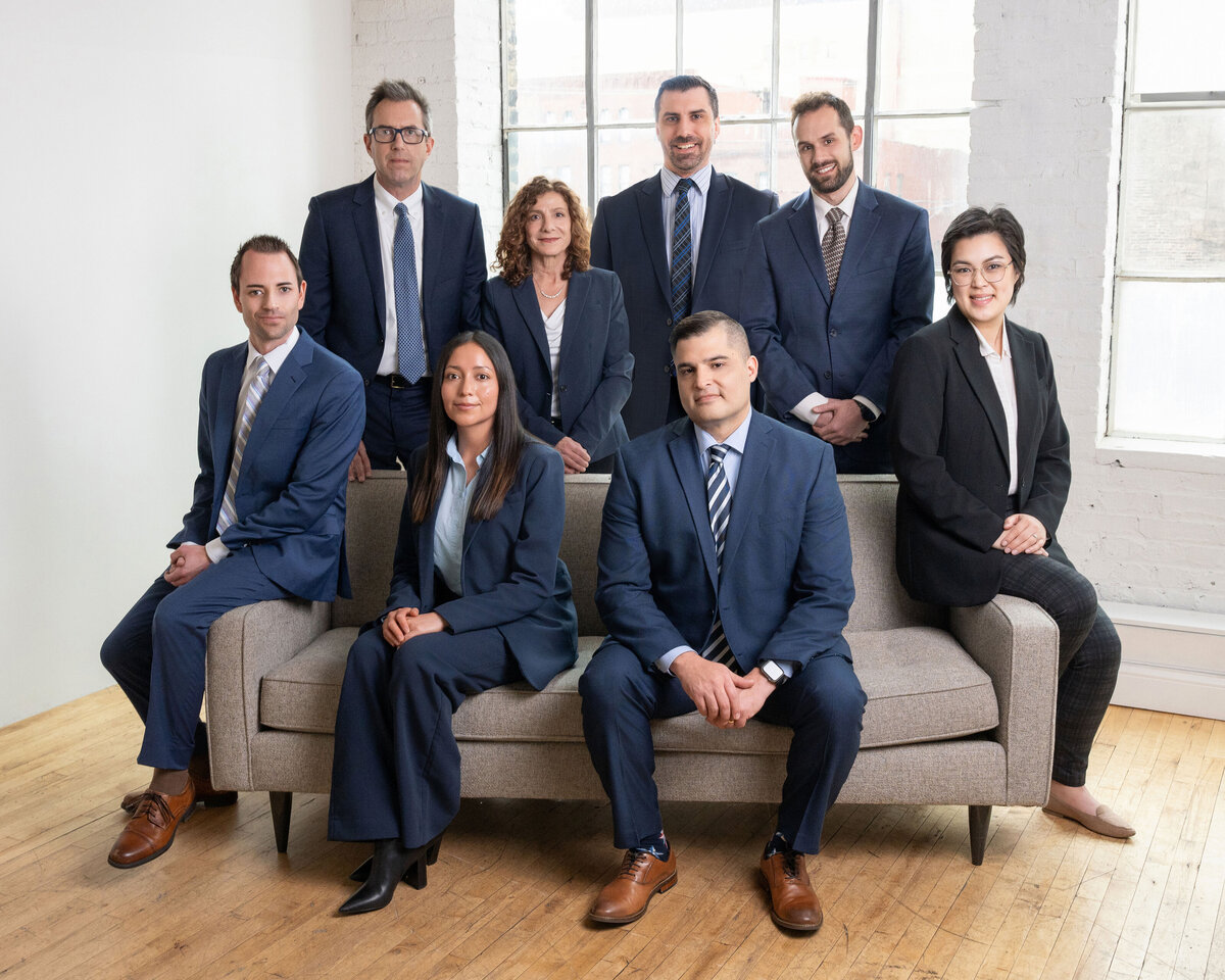 Group-of-lawyers-sitting-on-couch