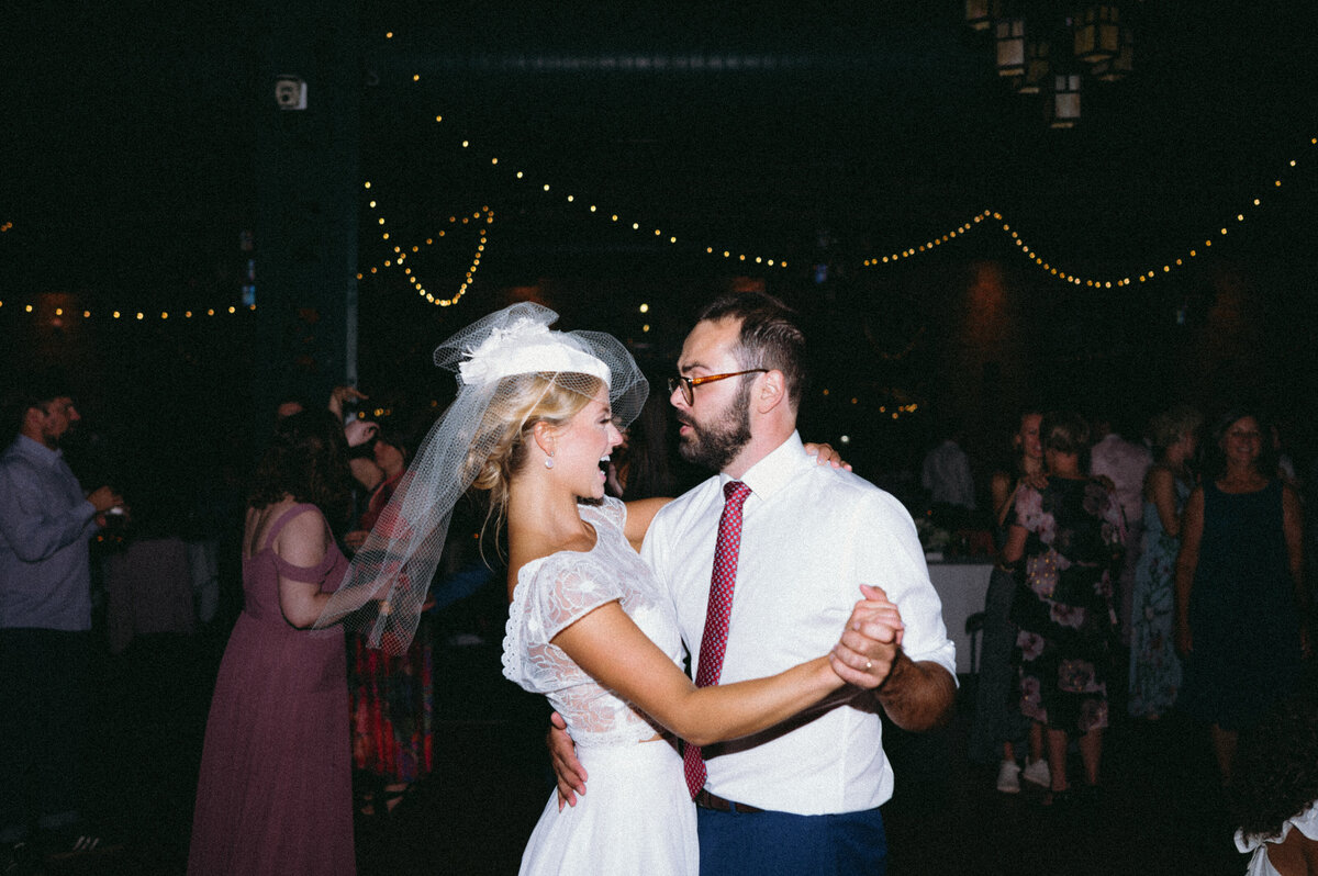 vintage-inspired wedding reception, couple dancing, flash photo