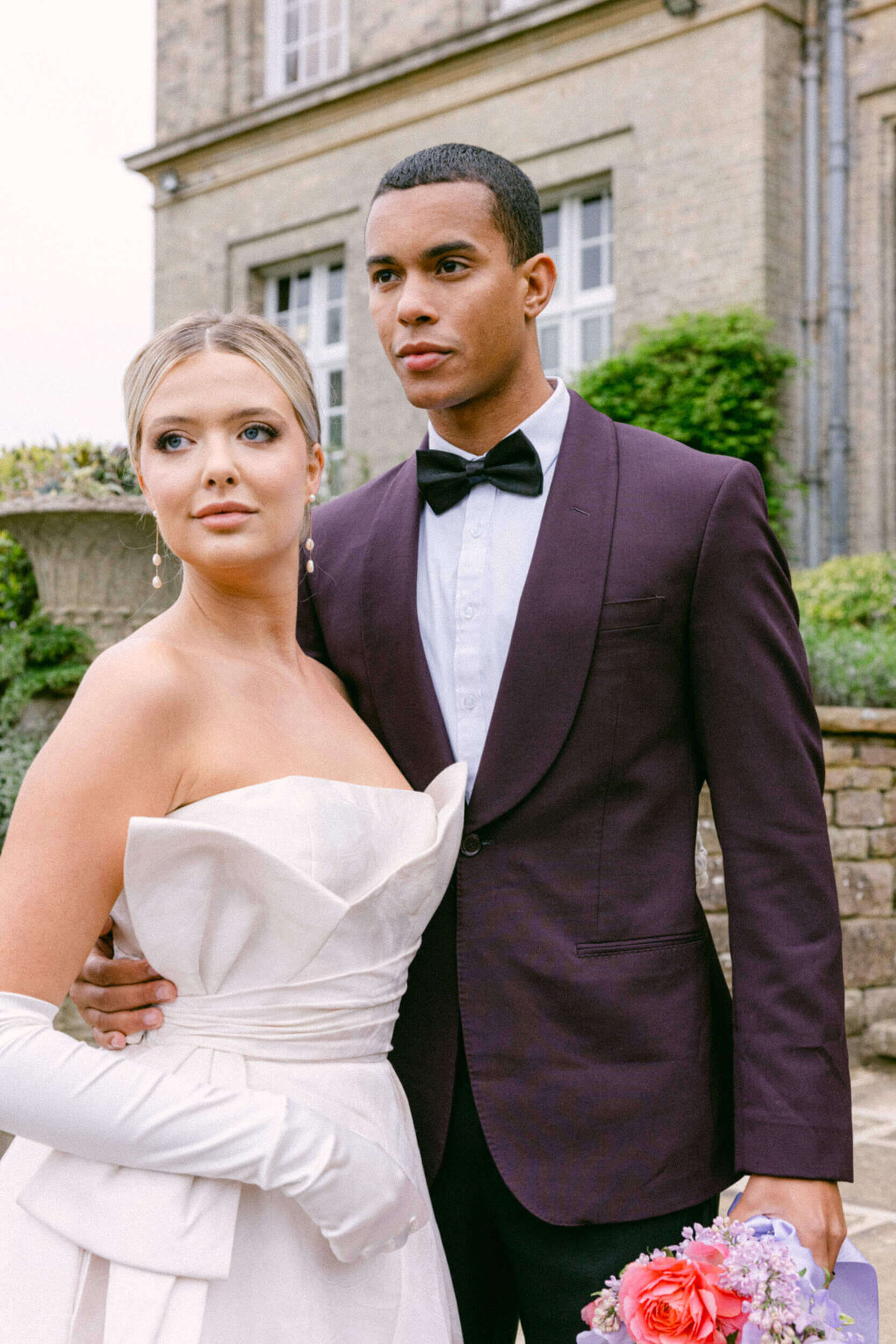 A wedding day photo of the bride and groom at Hedsor House in the Uk