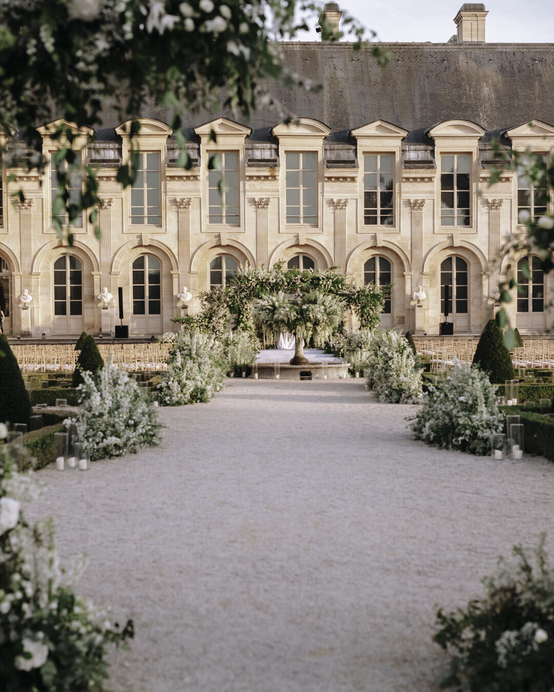 Paris Destination Wedding at Chateau de Chantilly by Alejandra Poupel Events Vertical road to the huppah picture