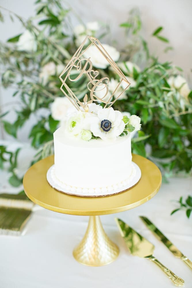 white-wedding-cake-gold-geometric-initial-topper