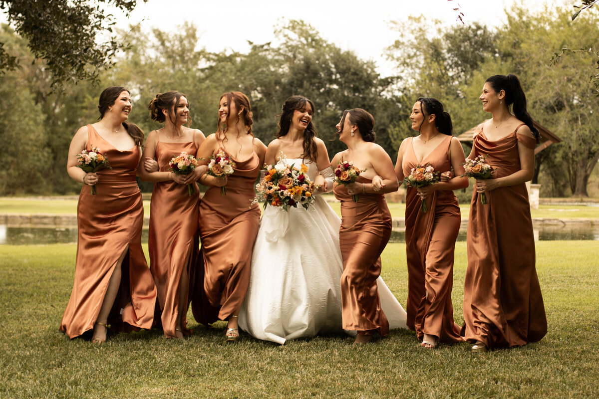 bridal party walking prompted photo