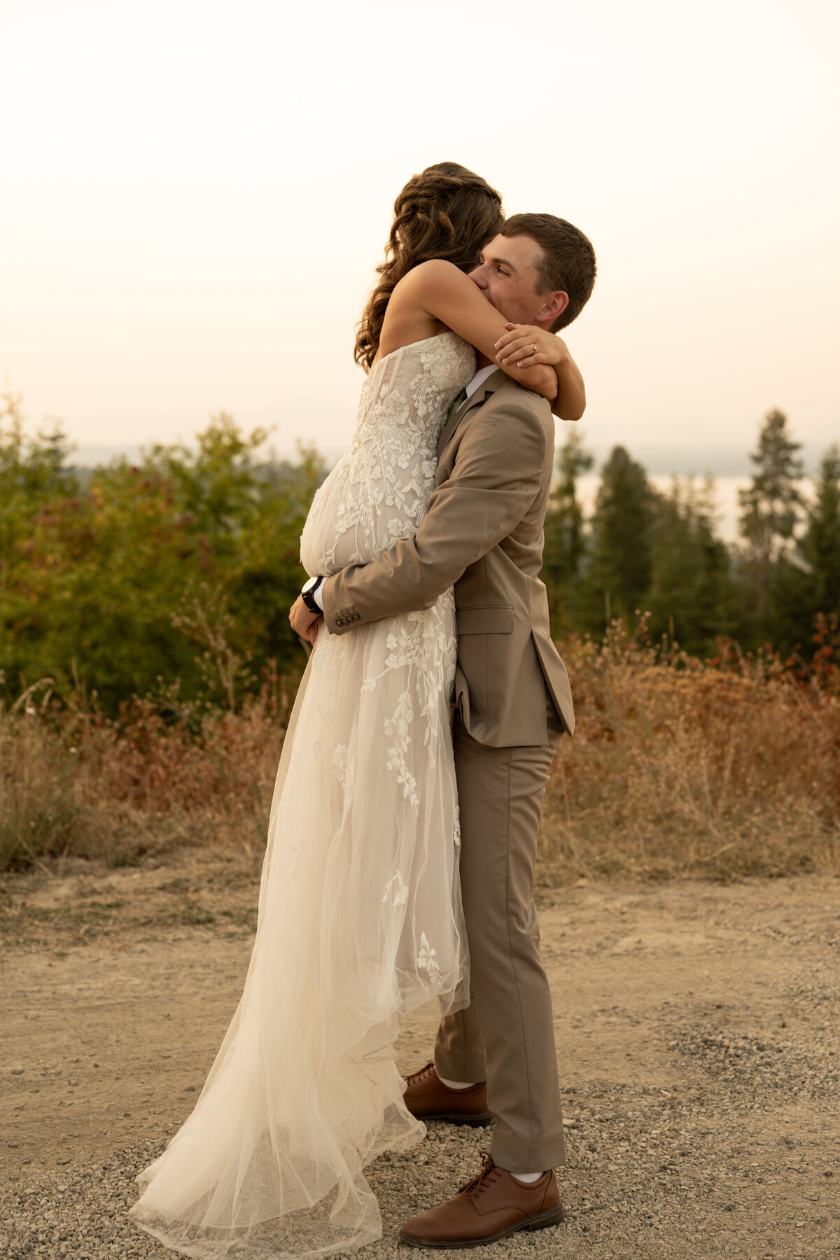 Bride and groom hugging