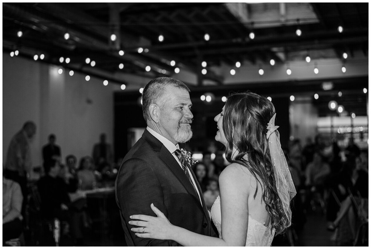 Father of the bride dances with his daughter during the father daughter dance at Skylight venue in Denver