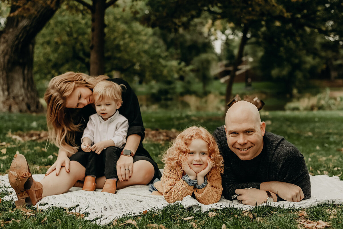 An artistic portrait from a fall family session at Washington Park in Denver, Colorado. Capturing candid moments with your family