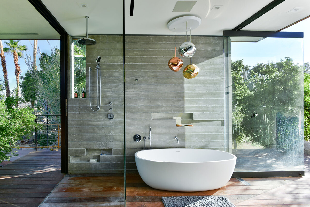 Master bathroom with concrete board formed walls designed by Los Angeles architect