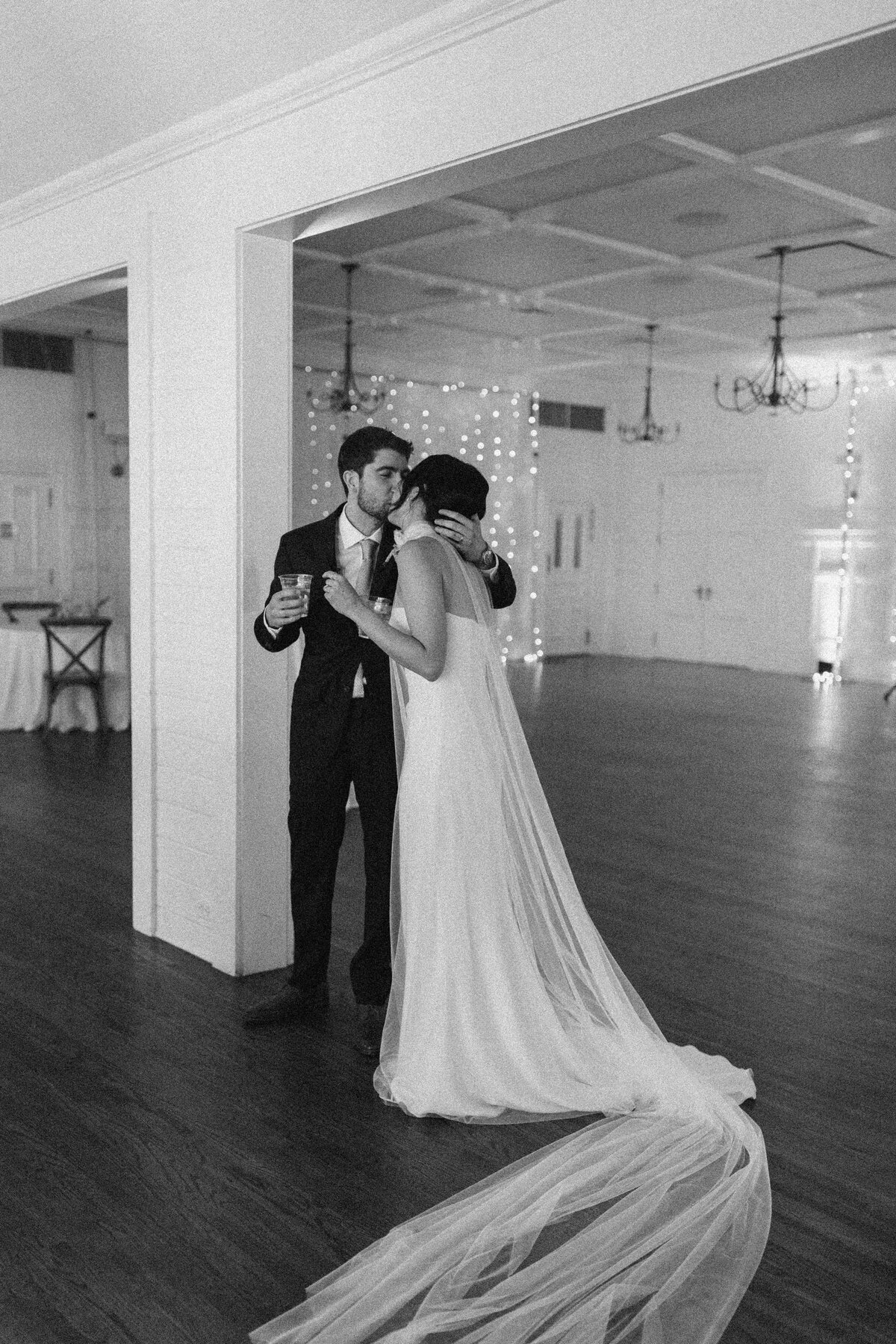Bride and groom in reception space of Mattie's wedding venue in Austin