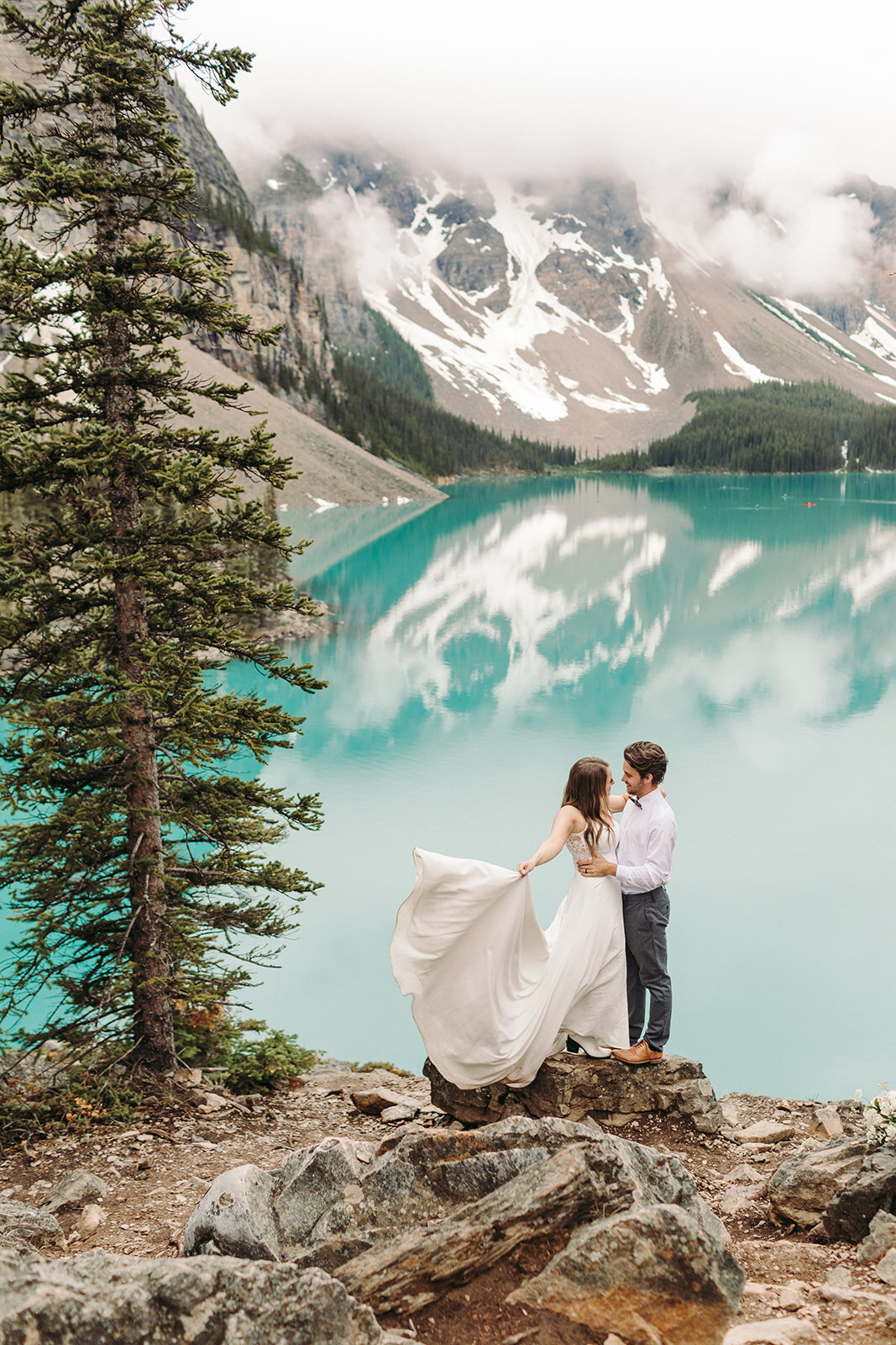 Utah Wedding Photography capturing couple looking at lake after spring wedding