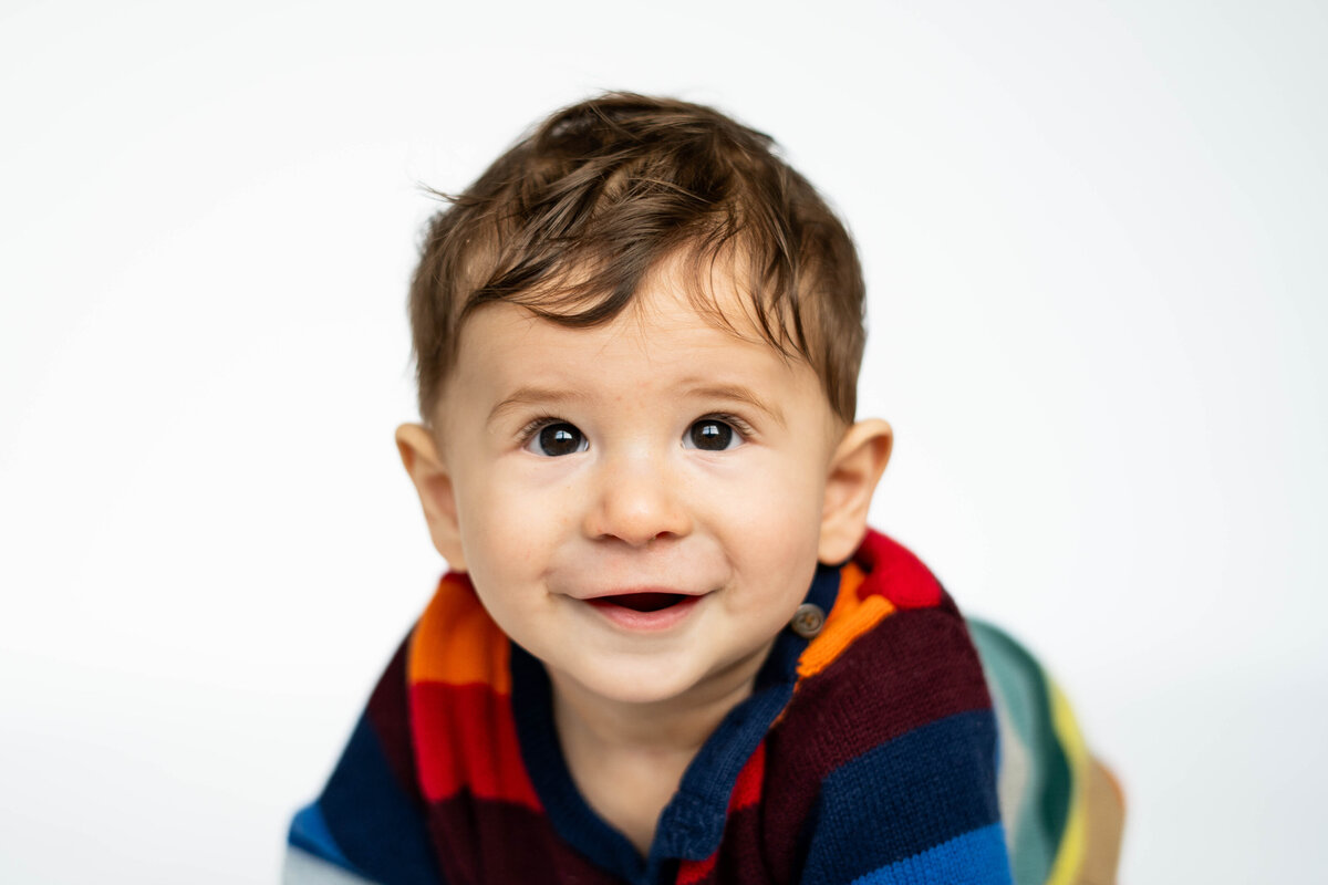 Little boy crawling during school photo