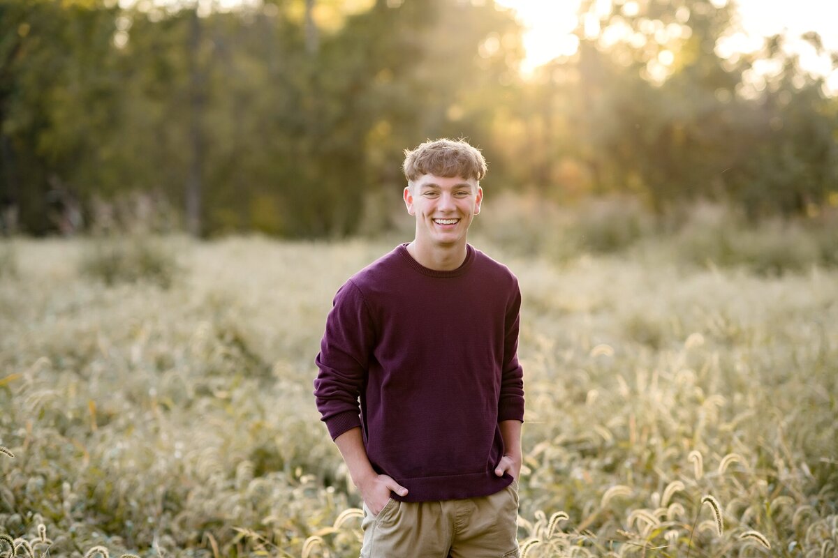 senior-guy-smiling-in-frederick-meadow