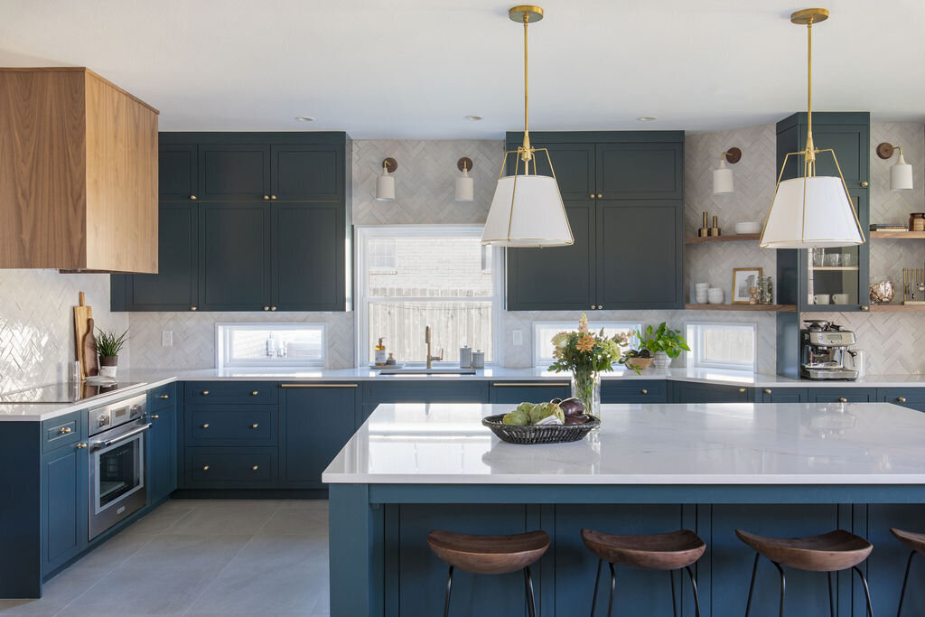 hello-home-austin-contemporary-navy-kitchen-remodel-wood-vent-hood-zelliege-herringbone-backsplash-open-layout-12