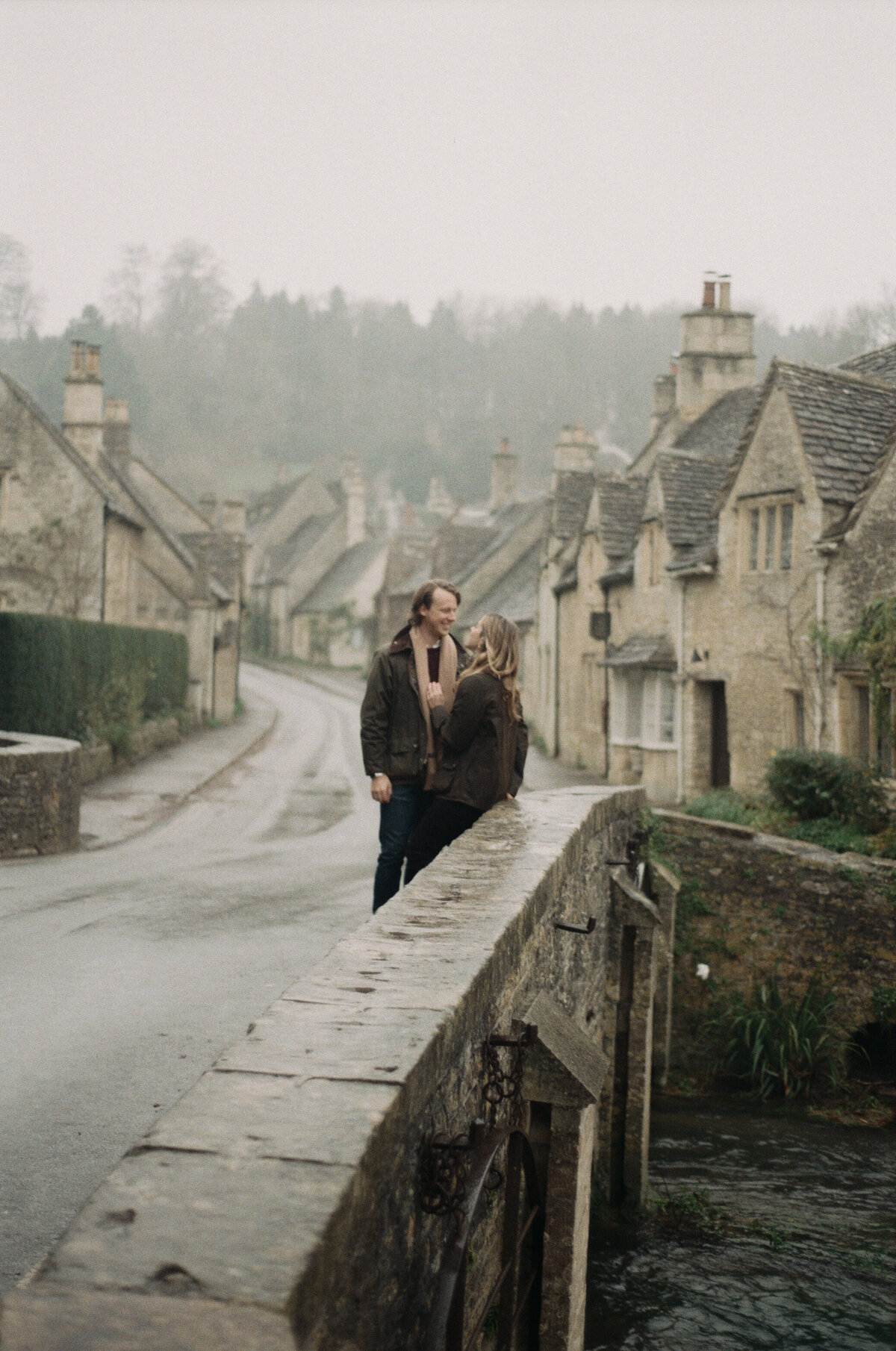 Engagement portraits in Castle Combe, Cotswolds captured on 35mm film