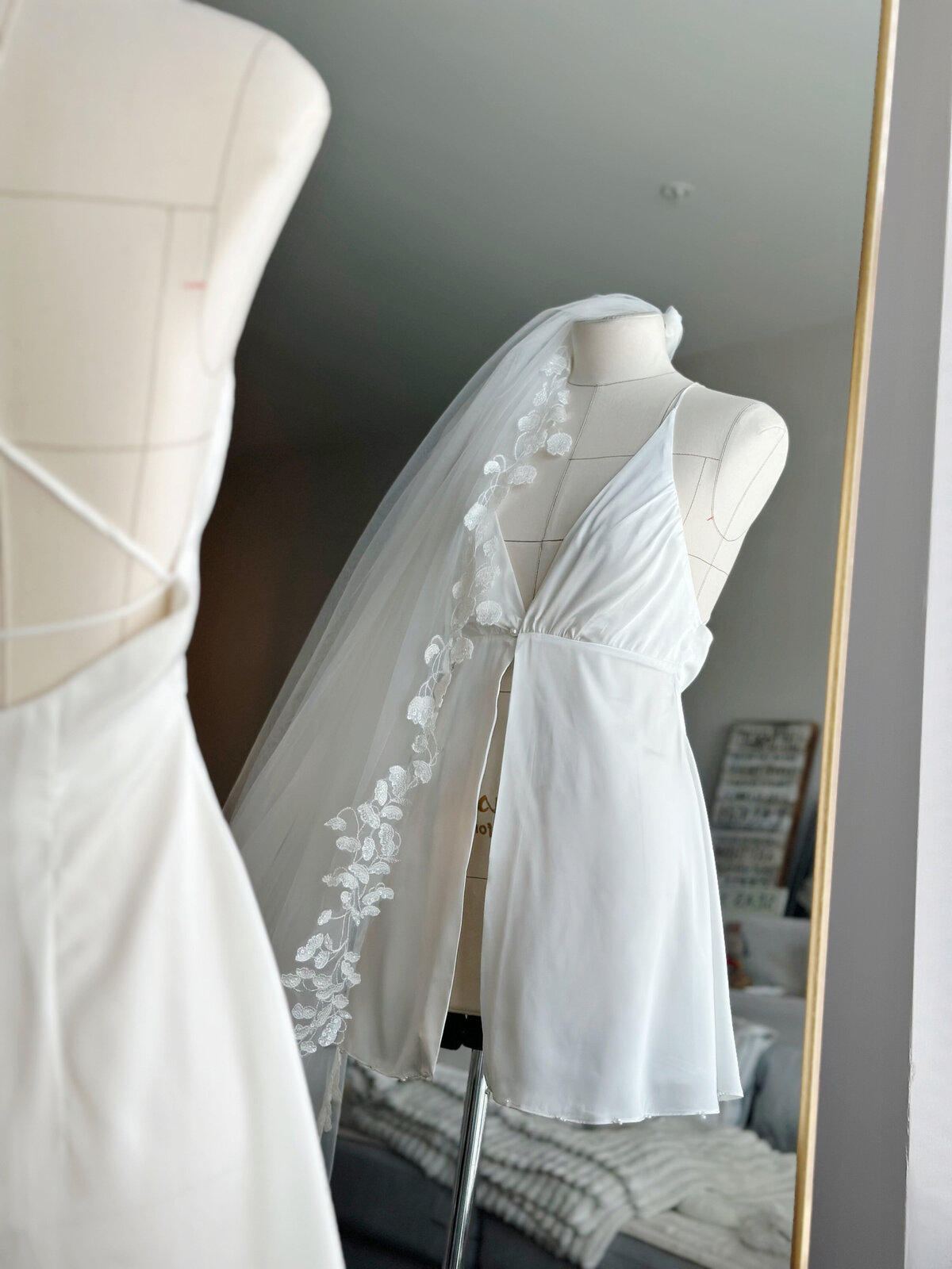 Buttery soft slip gown with fine beaded straps and modern silhouette
