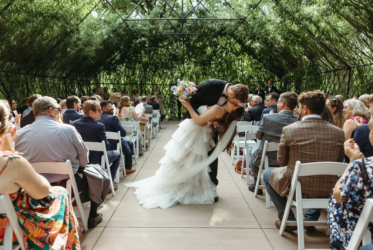 Bride and groom kissing