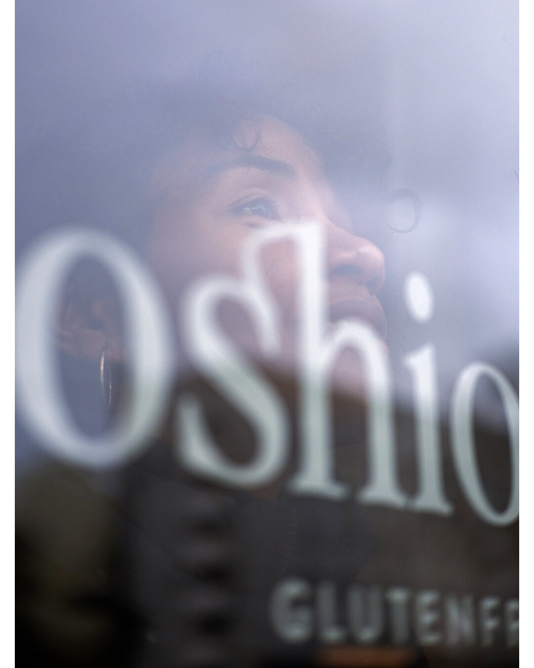 Oshione Logo on Window