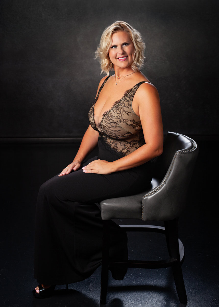 Blonde Woman sitting up in chair beauty photoshoot