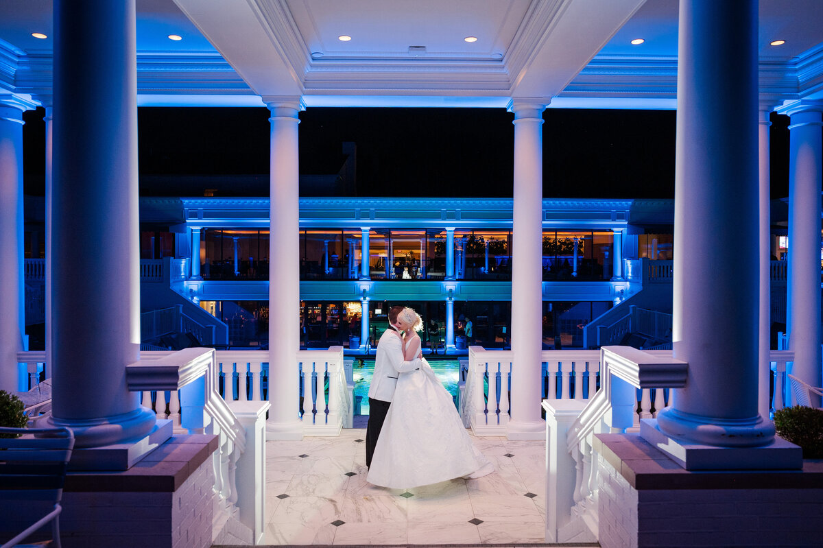 cool wedding photo of a married couple at the roman baths pool area of The Grand Resort in warren ohio