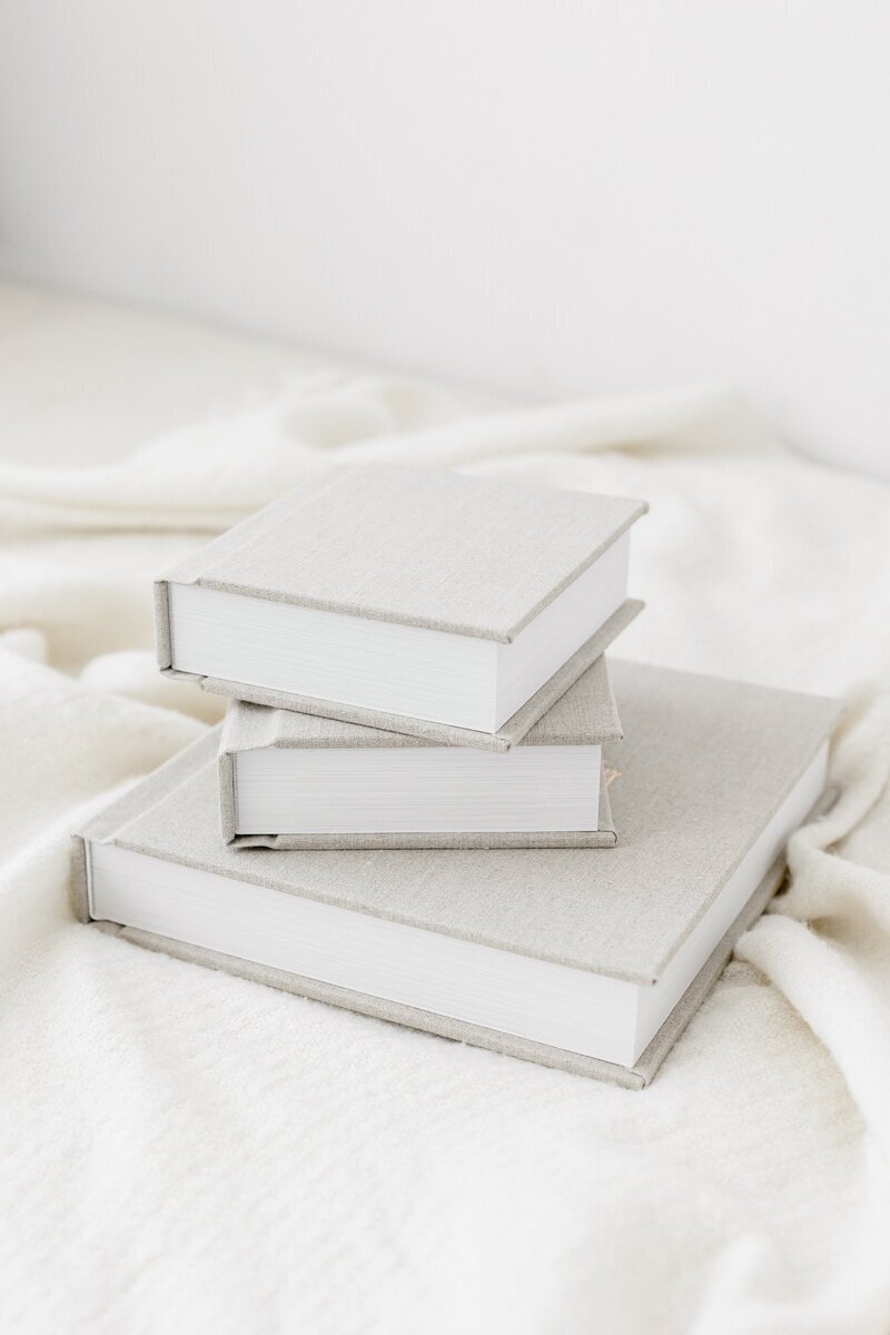 Printed albums in a stacy by nj portrait photographers​
