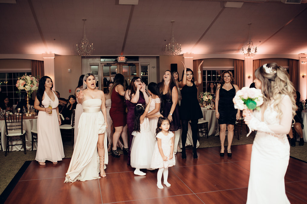 Wedding Photograph Of Women In White And Maroon Dresses Laughing Los Angeles