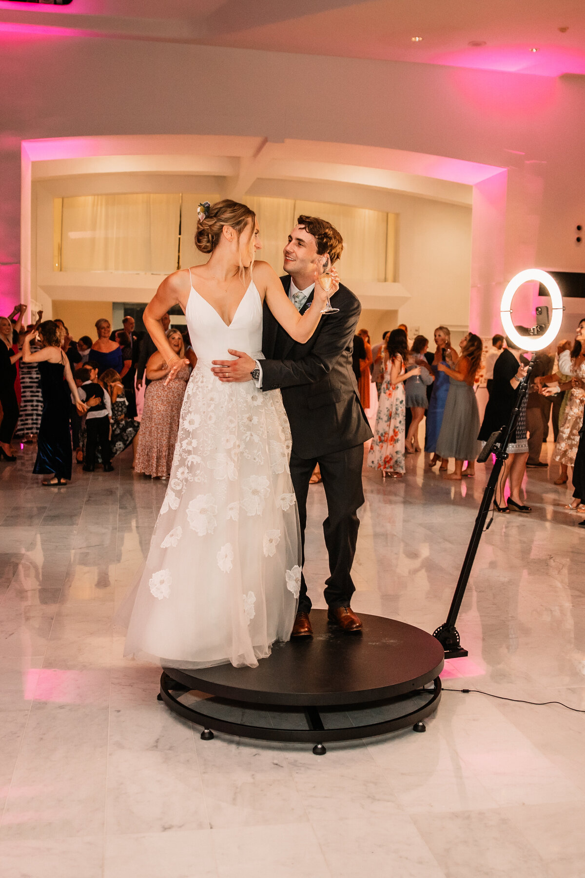 Newlyweds Dance On A Revolving Selfie Stand At Their Wedding Reception