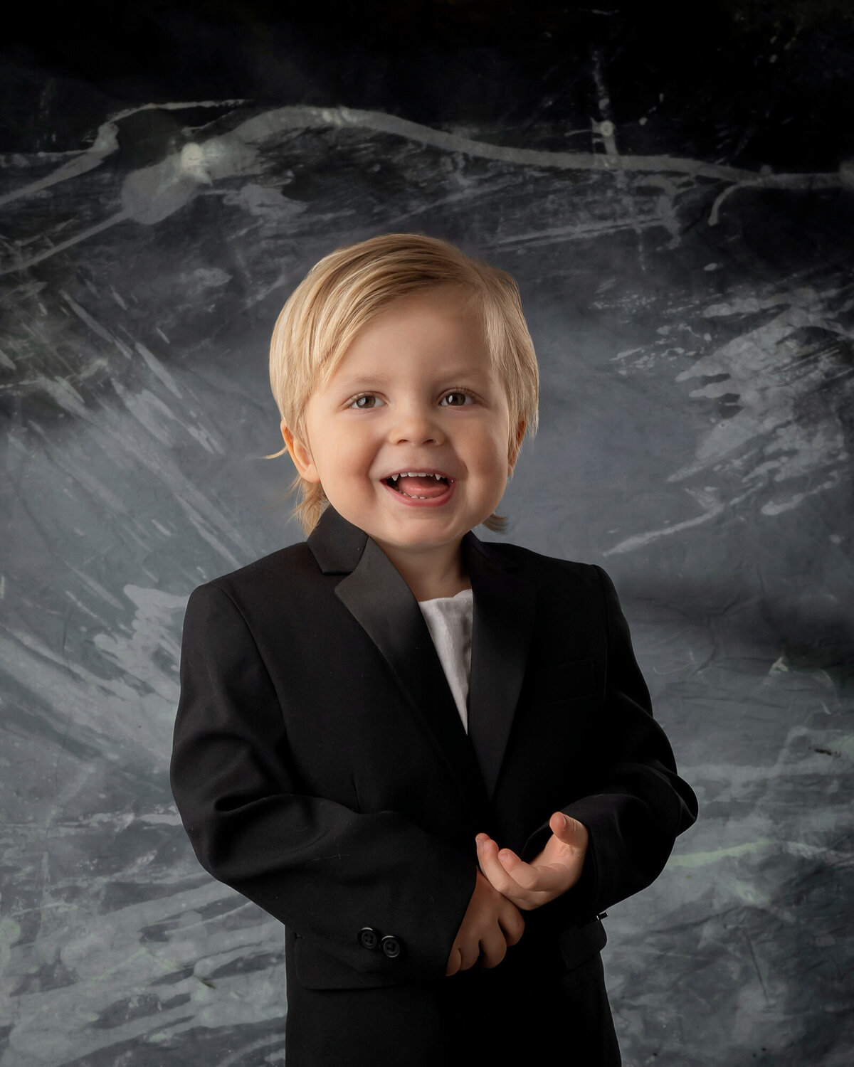 Closeup of a young boy that’s smiling big