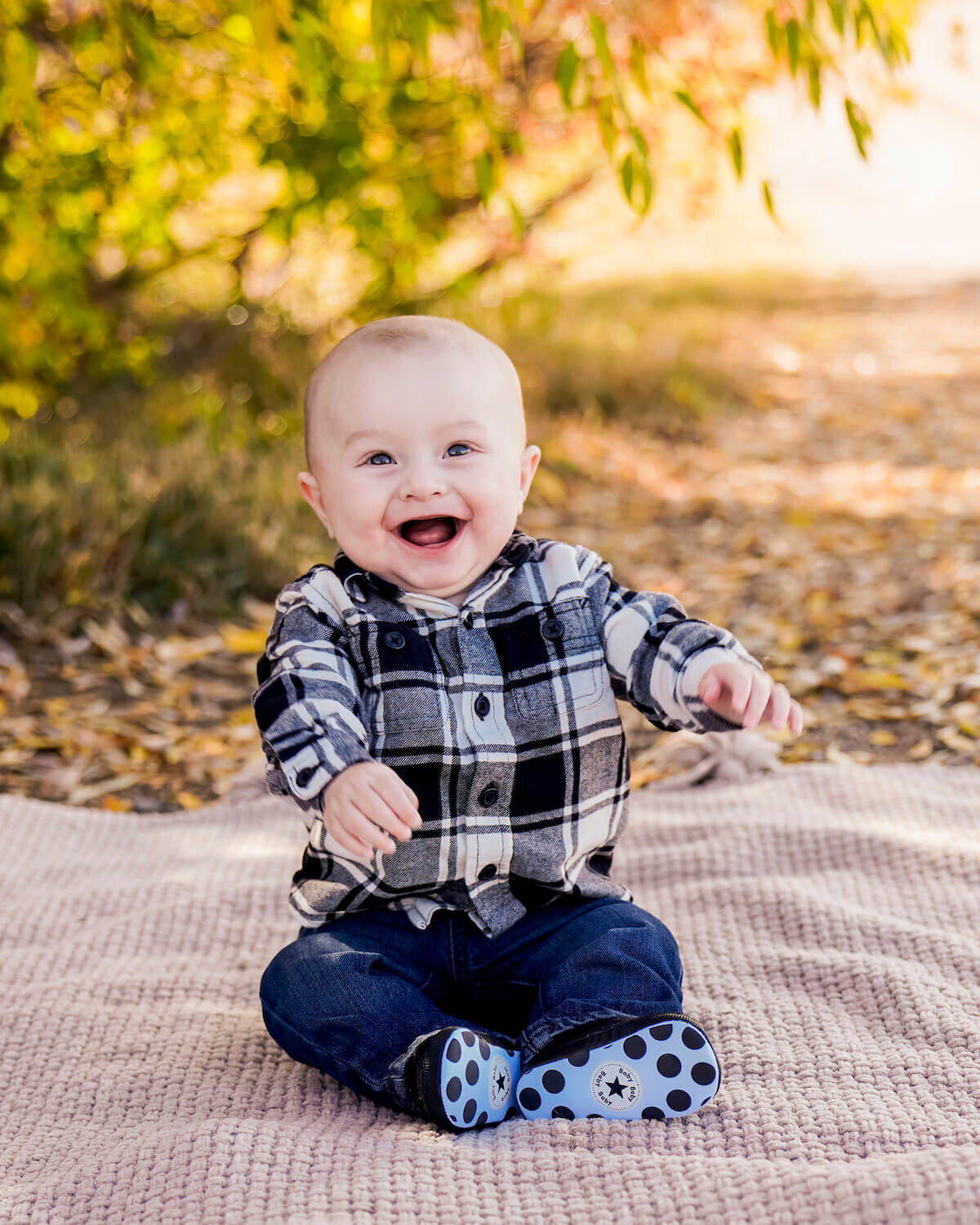 denver co family photographer - baby in plaid smiling