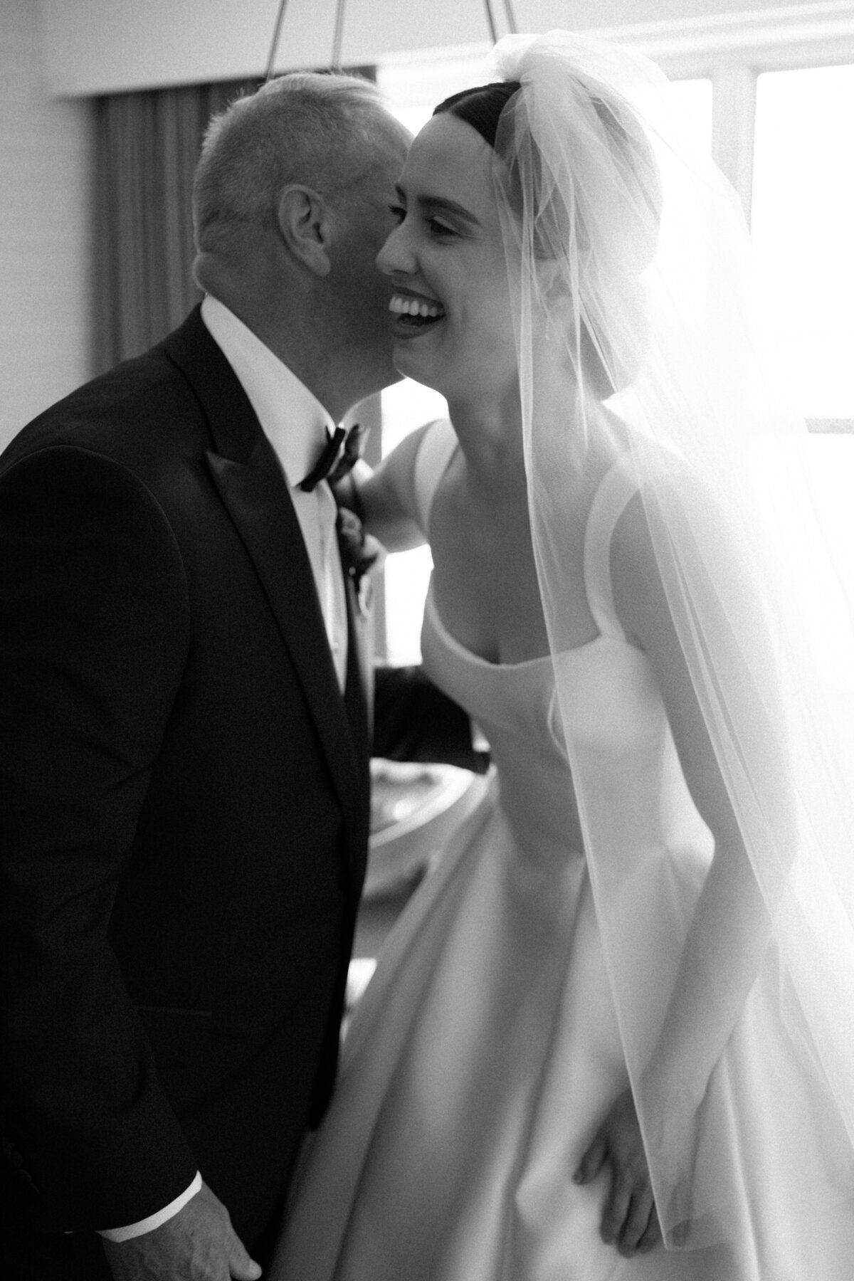 Bride hugging and laughing, chicago wedding photos by Allison Francois Photography