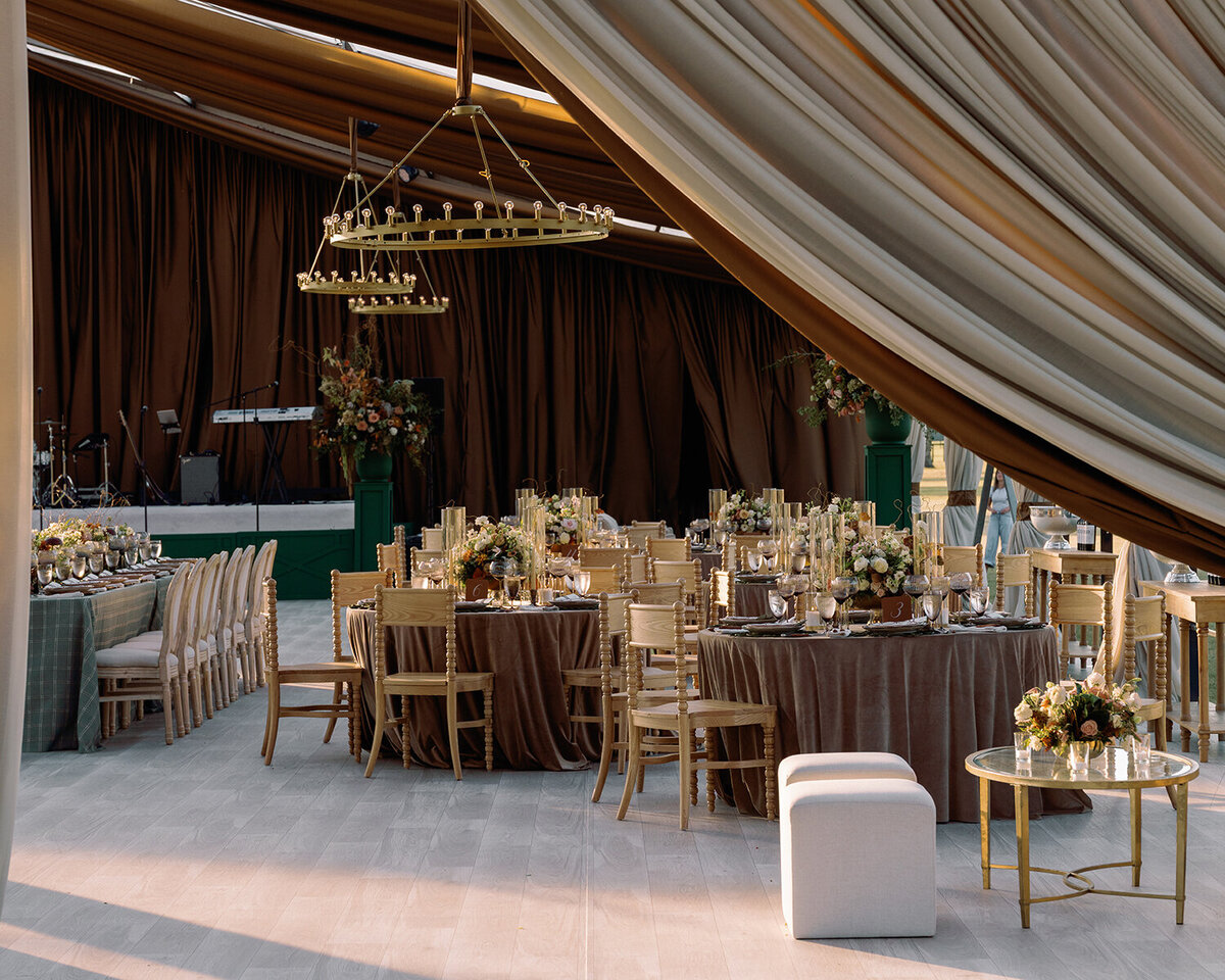 Luxury tented, brown drapping, green and brown wedding design