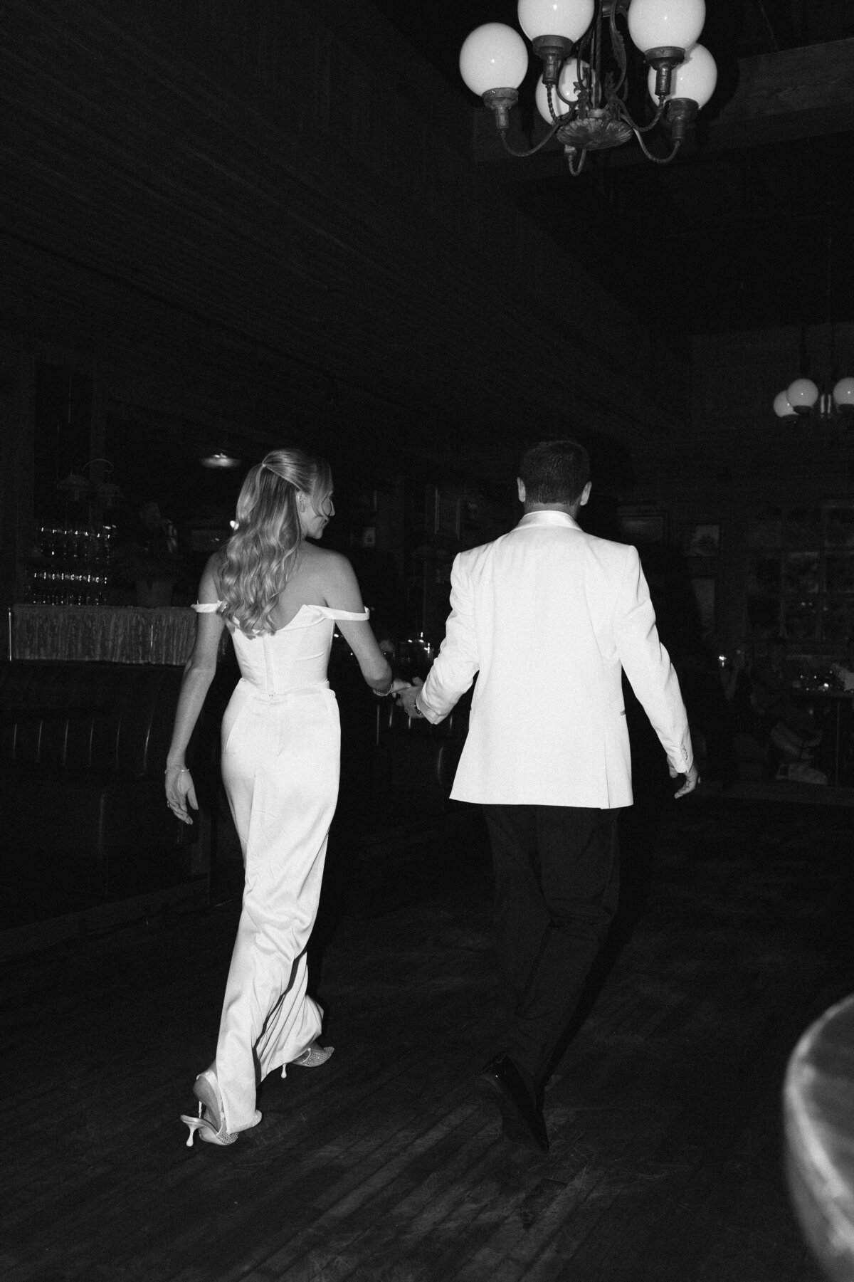 Editorial wedding photography at Trivoli Tavern Chicago features Lauren Alatriste's fashion forward approach to reception coverage, creating sophisticated imagery that combines celebration elegance with luxury wedding aesthetics and authentic  emotion.