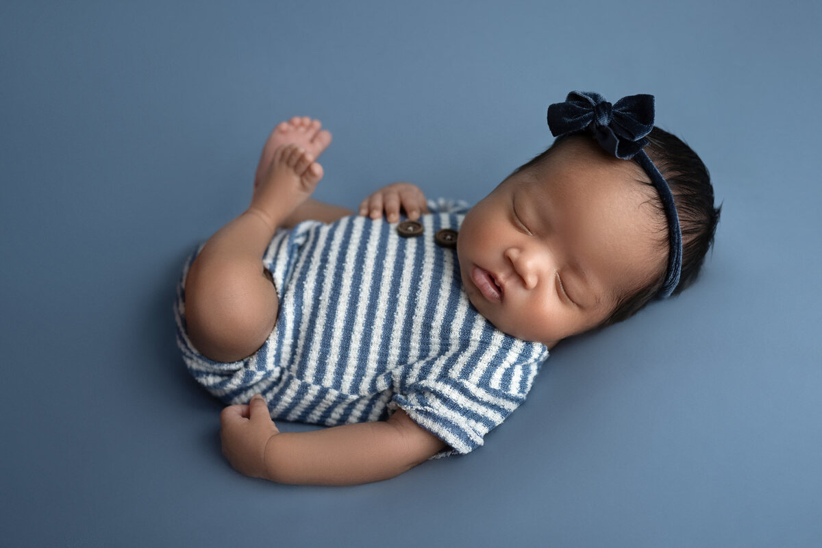 Newborn baby blue striped outfit Round Rock professional maternity photographer